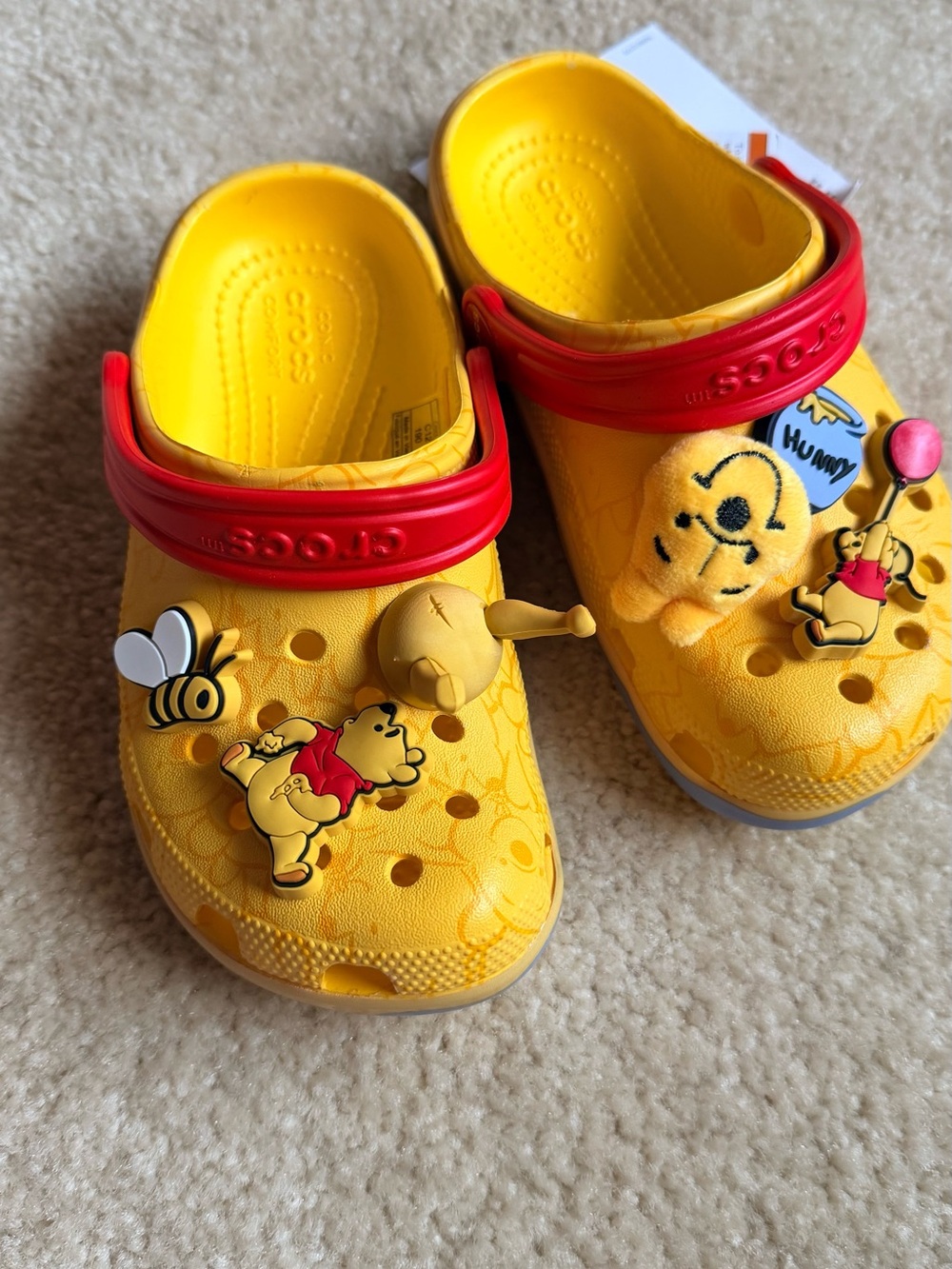 CROCS Kids Yellow Winnie the Pooh Clogs with Red Heel Straps